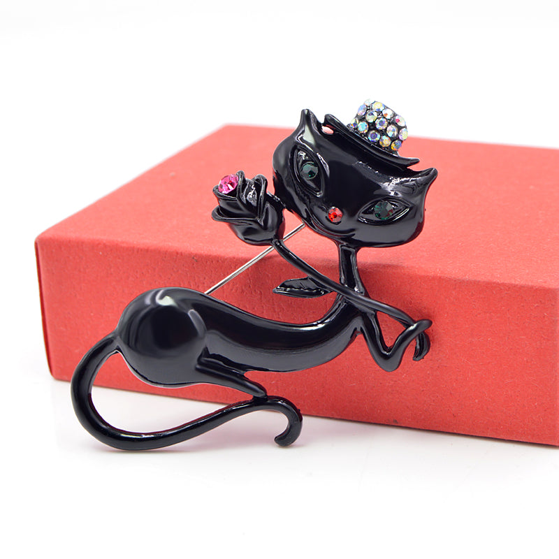 Cat Brooch <br> Black cat holding a flower